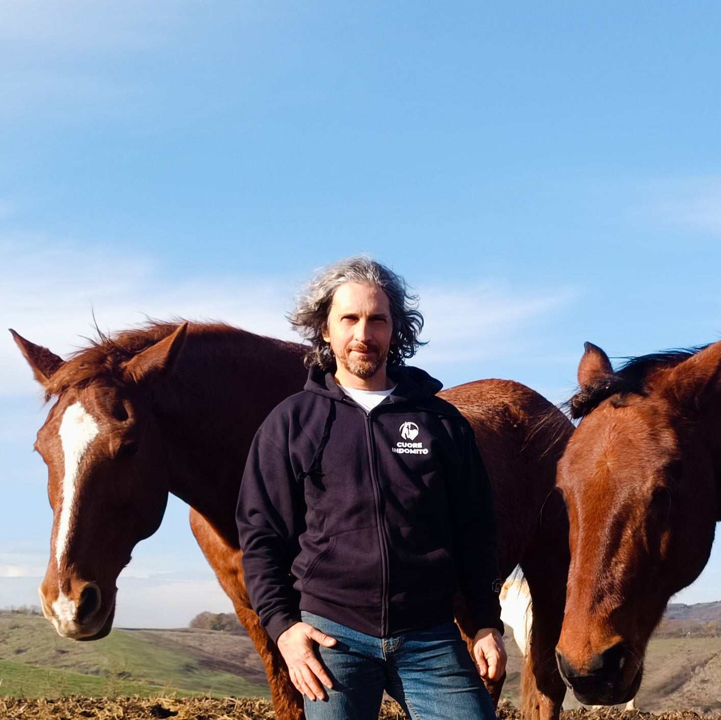 CUORE INDOMITO - Cotton fleece hoodie with IHP logo. Men's and women's versions.